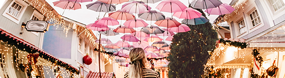 Street with umbrellas floating overhead